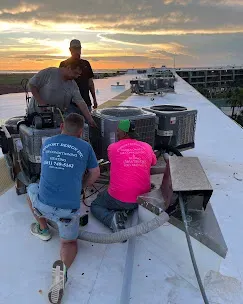 Fix Refrigerant Leak Fast: Essential AC Troubleshooting Tips 2 HVAC technician inspecting an air conditioning compressor, highlighting common issues